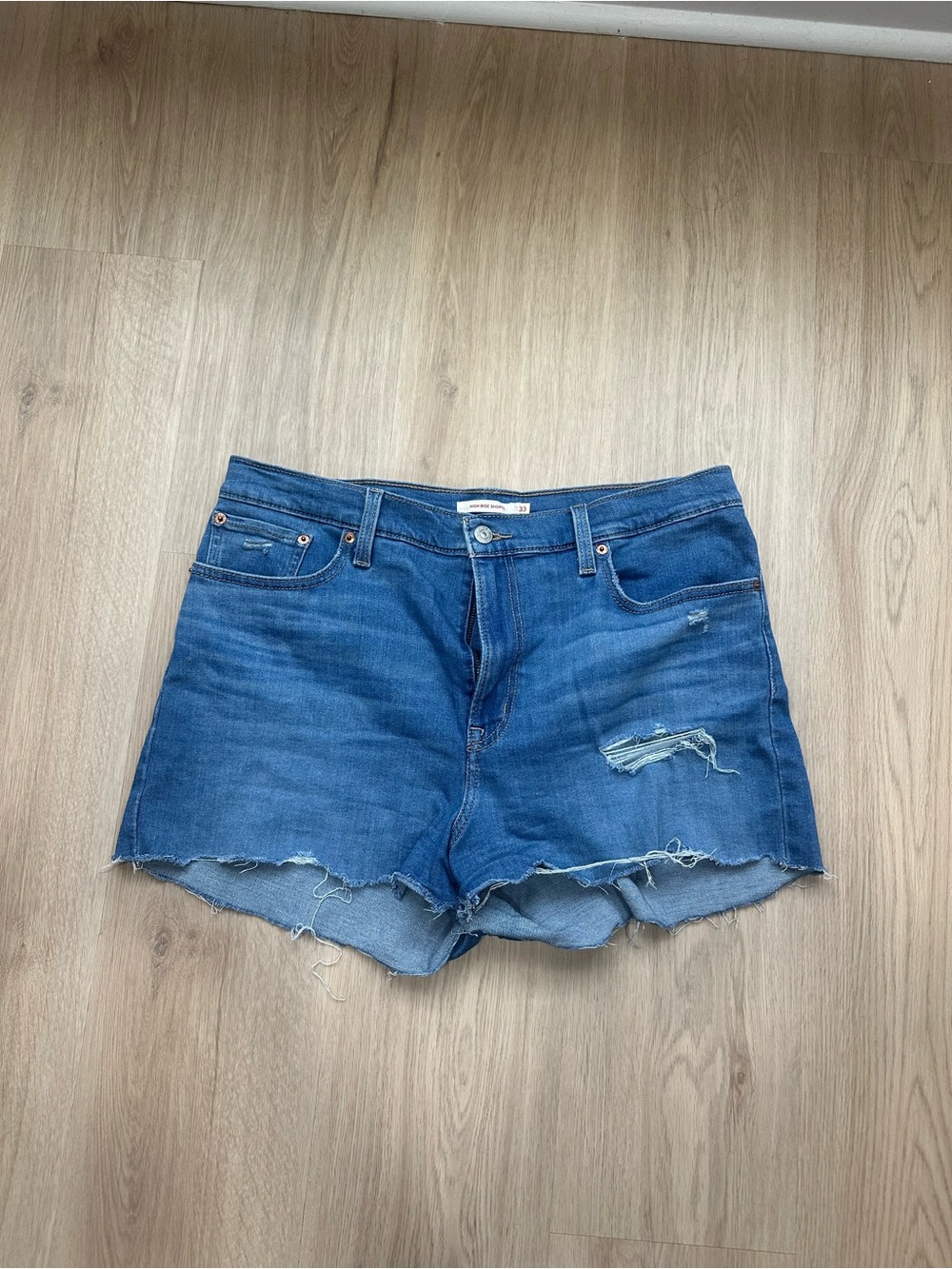 Levi's Medium Blue Frayed Hem Denim Shorts